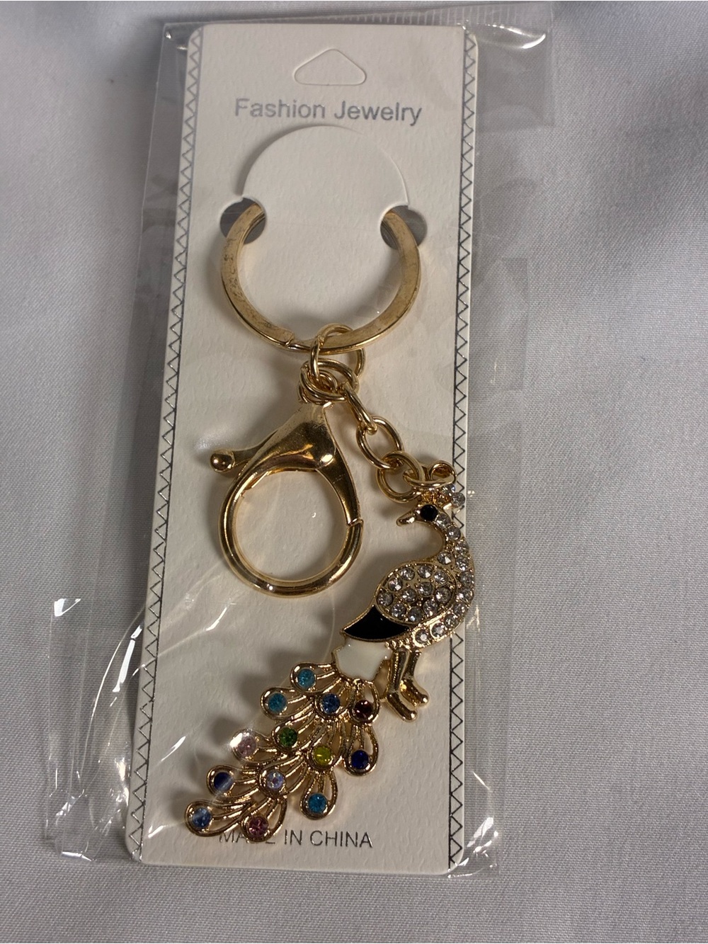 Gold Peacock Keychain with Black and Multicolor Crystal Accents